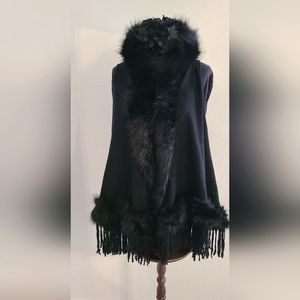 Hooded cape with faux fur trim